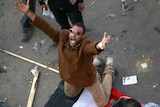 A protester shouts slogans during clashes at Tahrir Square in Cairo.