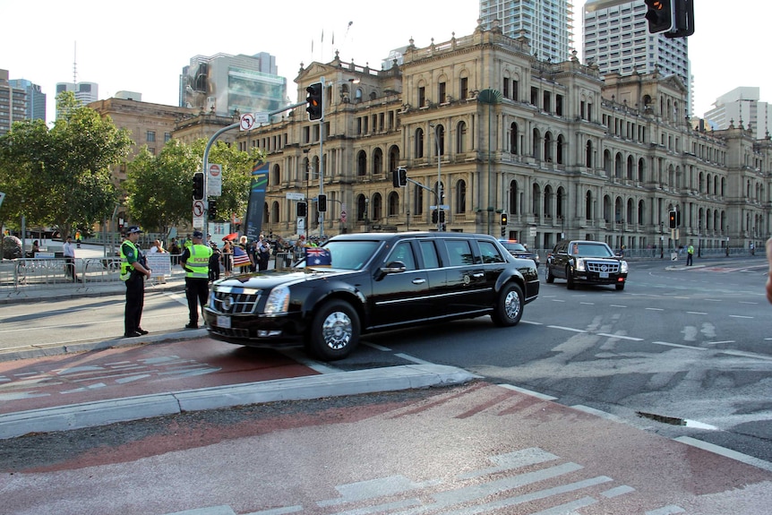 US president Barack Obama's motorcade makes it way through Brisbane shortly after he arrived for the G20 summit, November 15, 2014