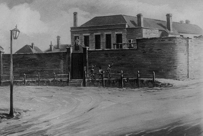 A black and white artist's rendering of an 1850s prison building.