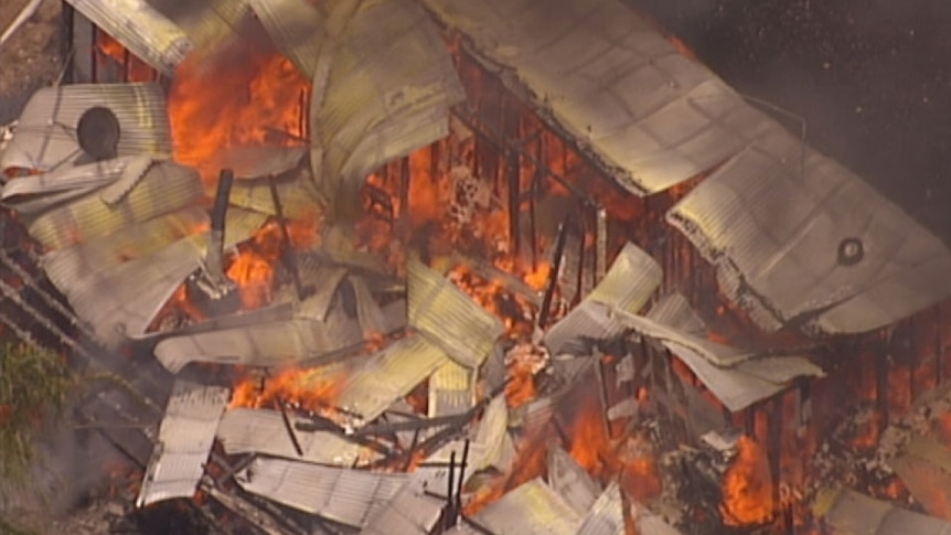 Police say no-one was home when fire engulfed this house at Greenbank, south of Brisbane.