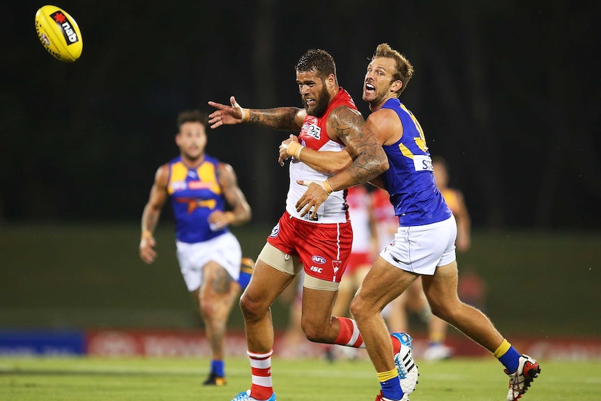 Buddy Franklin is wrapped up by the West Coast Eagles defence