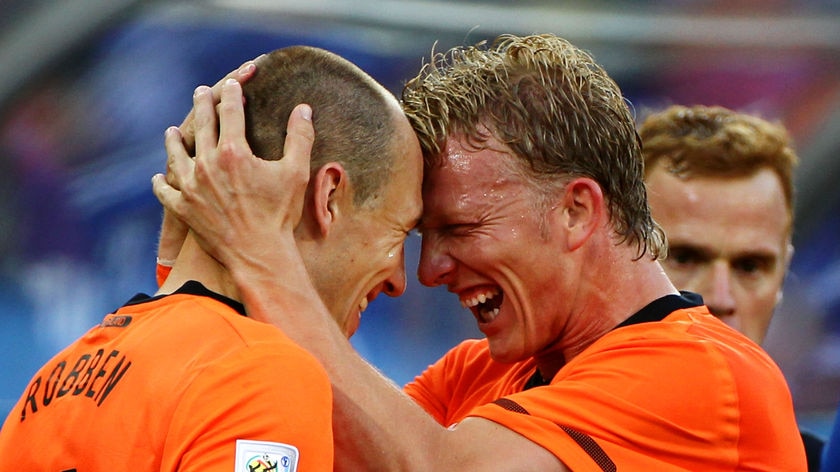 Arjen Robben (R) provided the spark a lacklustre Netherlands outfit needed on his first start this World Cup.