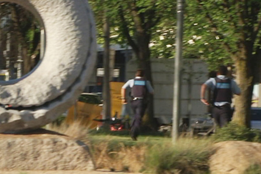 ACT police chase a young man through Civic.