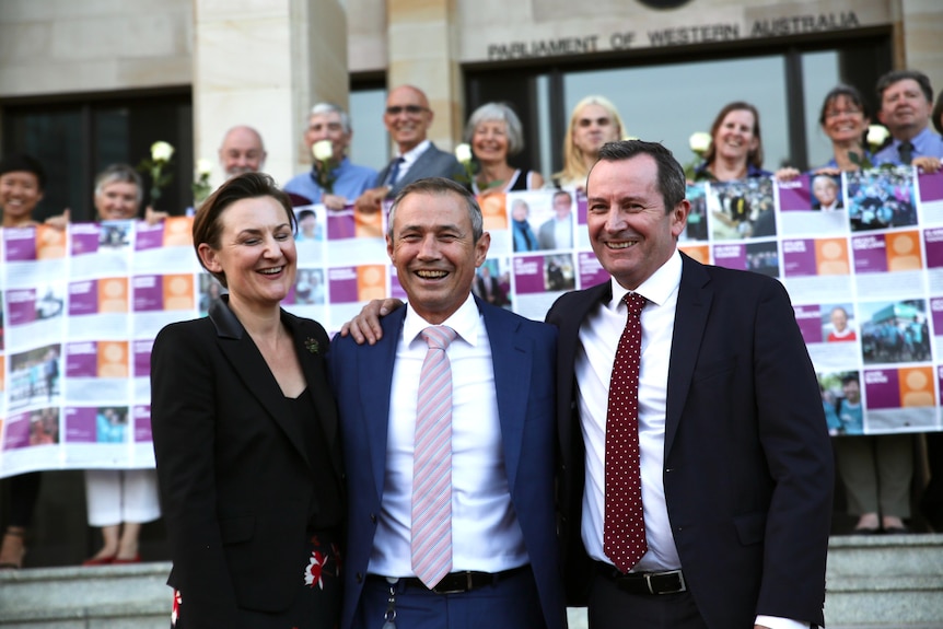 Amber-Jade Sanderson with Roger Cook and Mark McGowan outside parliament smiling