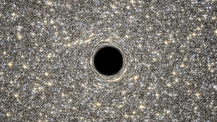A large black circle with millions of white and yellow dots around it. This is an illustration of a supermassive black hole.