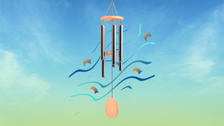 Wind chimes floating in a blue sky.