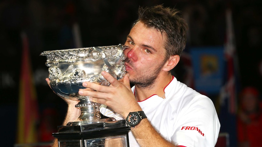 Wawrinka shows off the Australian Open trophy