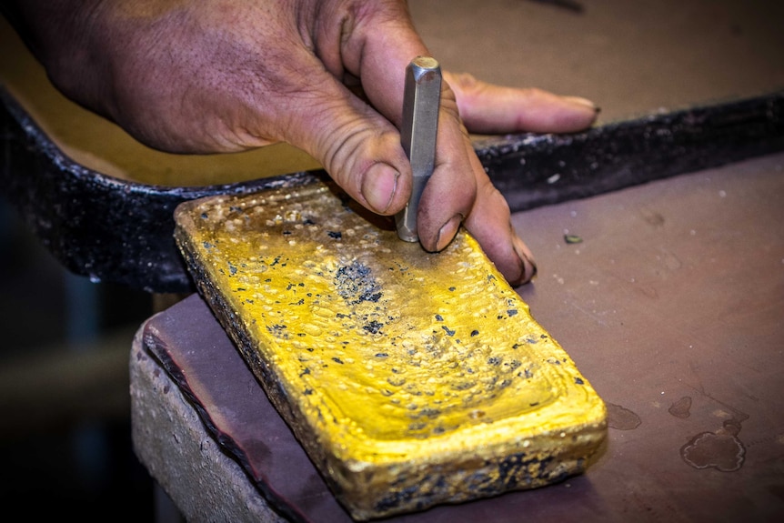 Gold bar being stamped in Kalgoorlie