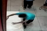 A boy accidentally punches a hole through a painting in Taiwan