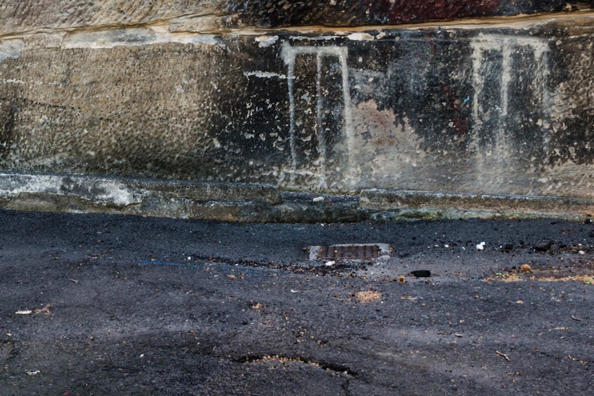 Over 50 years ago, kids played laneway cricket here using these painted wickets.