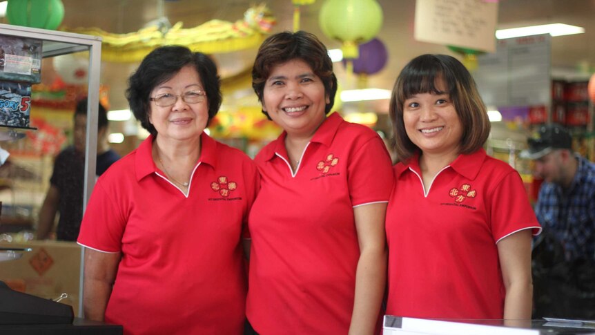Three women in red tshirts.