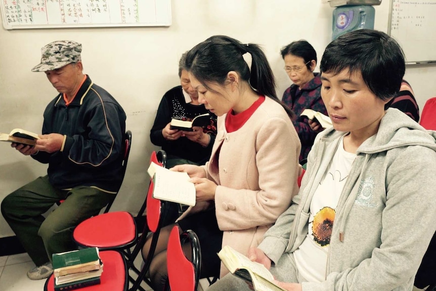 People attend their small underground Protestant church in Beijing.