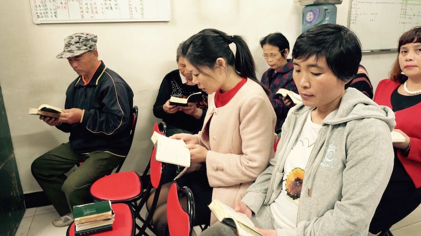 People attend their small underground Protestant church in Beijing.