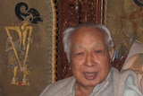 Former Indonesian president Suharto attends an interview at his house in Jakarta.