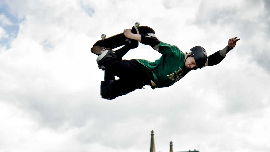 World champion skateboarder Tas Pappas on his board above the Prahrahn Ramp in Melbourne.