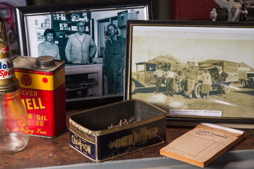 Picture frames and automobile museum items on display