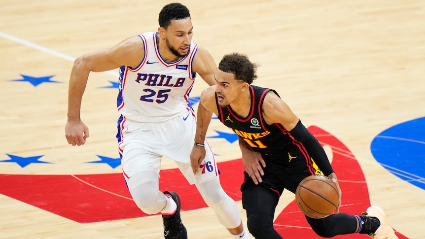 Philadelphia 76ers player Ben Simmons chases Atlanta Hawks guard Trae Young during an NBA playoffs game.