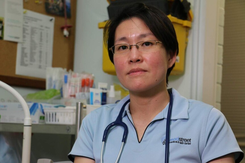 Dr Hui Cheng Tay with a stethoscope around her neck in an office.