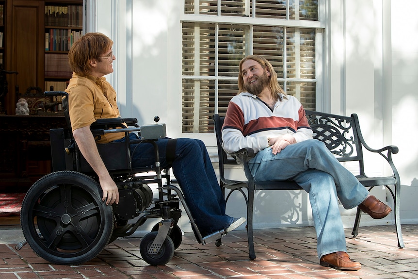 Colour still of Joaquin Phoenix and Jonah Hill in a scene from 2018 film Don't Worry, He Won't Get Far on Foot.