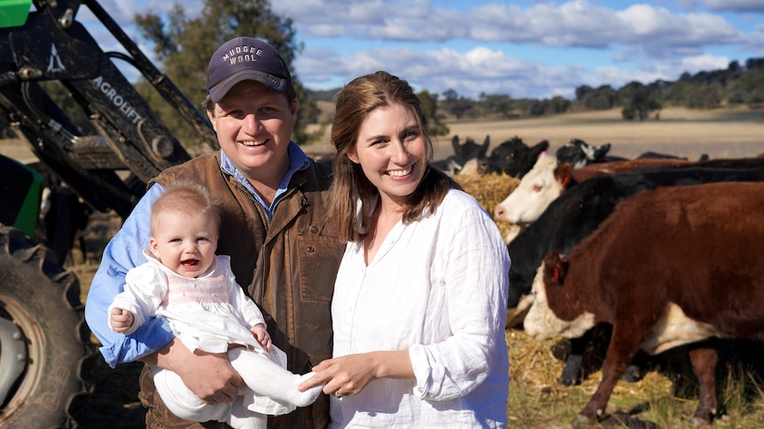 Lucinda and Tim Flynn with their baby Charlotte