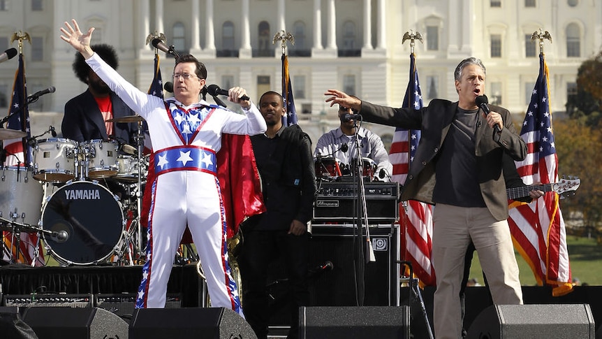 Comedian Stephen Colbert (L) addresses the crowd with Jon Stewart (R) during their Rally to Restore Sanity (Jason Reed: Reuters)