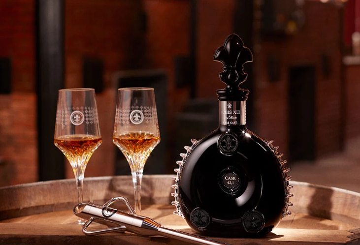 MMA upstart delivers knockout cognac gift to Brisbane Olympic committee