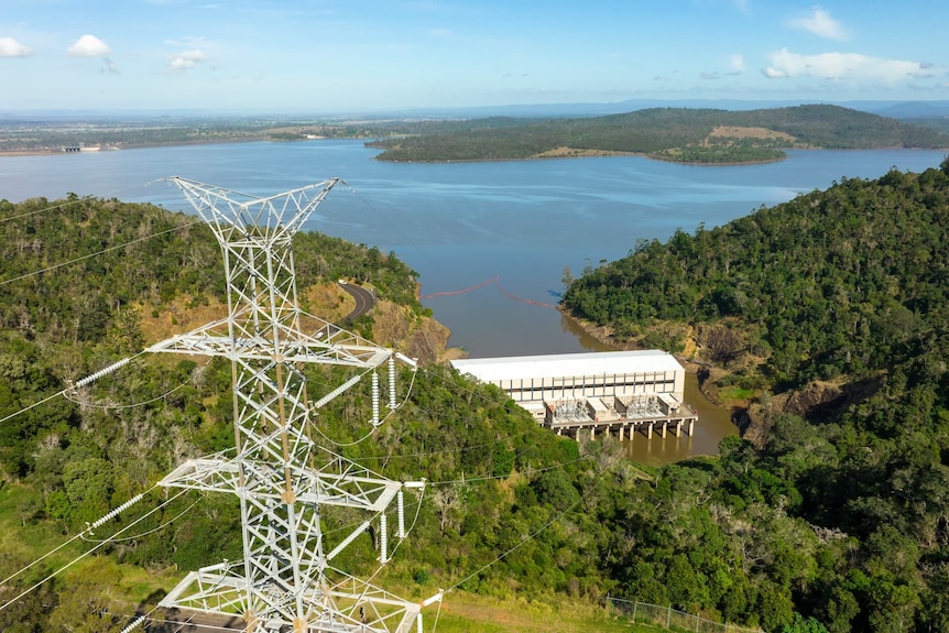 Aerial photo of Wivenhoe Dam, north-west of Brisbane with power lines