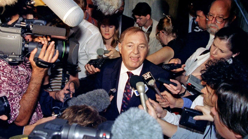 Alan Bond answers media questions after his personal creditors freed him from bankruptcy in 1995.