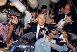 Alan Bond answers media questions after his personal creditors freed him from bankruptcy in 1995.