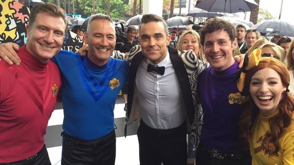 Robbie Williams and The Wiggles share a hug on the red carpet ahead of the ARIA Awards