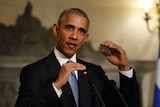 President Barack Obama gestures while speaking during a joint news conference with Greek Prime Minister Alexis Tsipras.