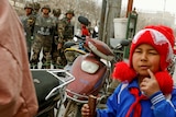 Security personnel keep watch in a street in Kashgar, Xinjiang Uighur Autonomous Region, China, March 23, 2017.