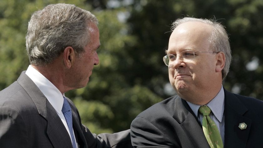 Karl Rove (r), with George W Bush, announces he will be leaving the administration on August 31.