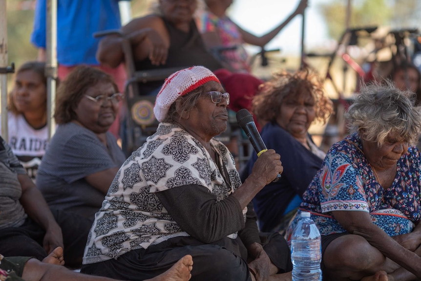 A woman speaks at a NPY Women's Council meeting.