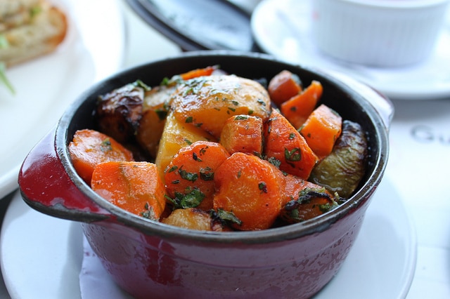 Beef and vegetable stew in a dish.