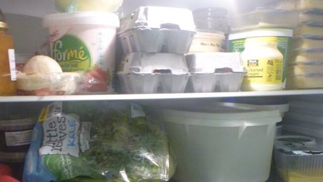 inside a full looking fridge