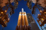 The Mobile Service Tower is rolled back to reveal the United Launch Alliance Delta IV Heavy rocket