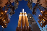 The Mobile Service Tower is rolled back to reveal the United Launch Alliance Delta IV Heavy rocket