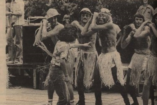 A woman confronts a group of men during a mock haka performance in 1979.