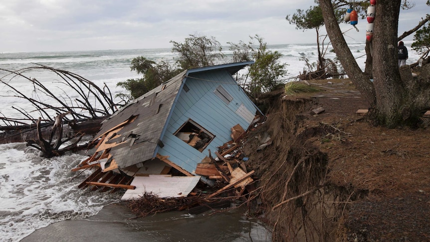 Storm washes away house on beach in US