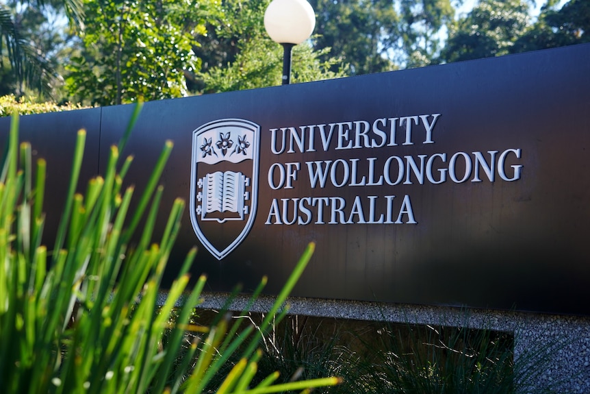 A sign that reads "University of Wollongong Australia".