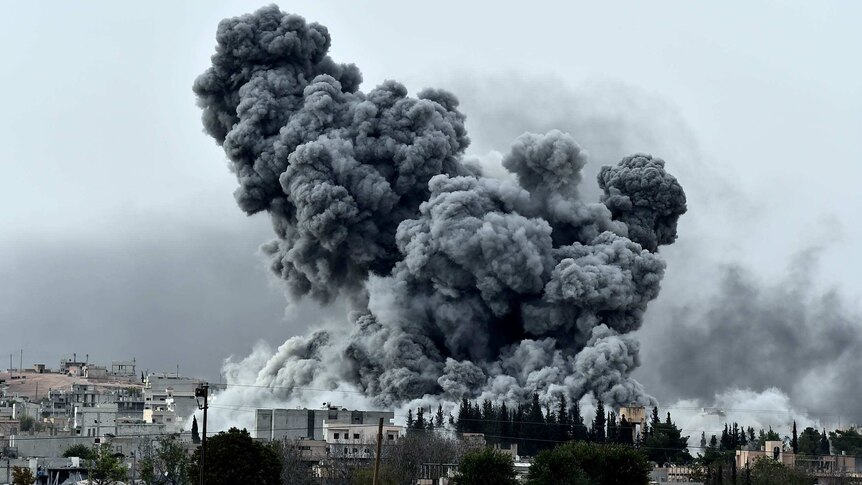 Smoke rises over Kobane