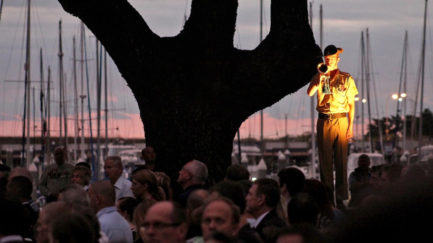 A bugler plays at an Anzac Day dawn service.