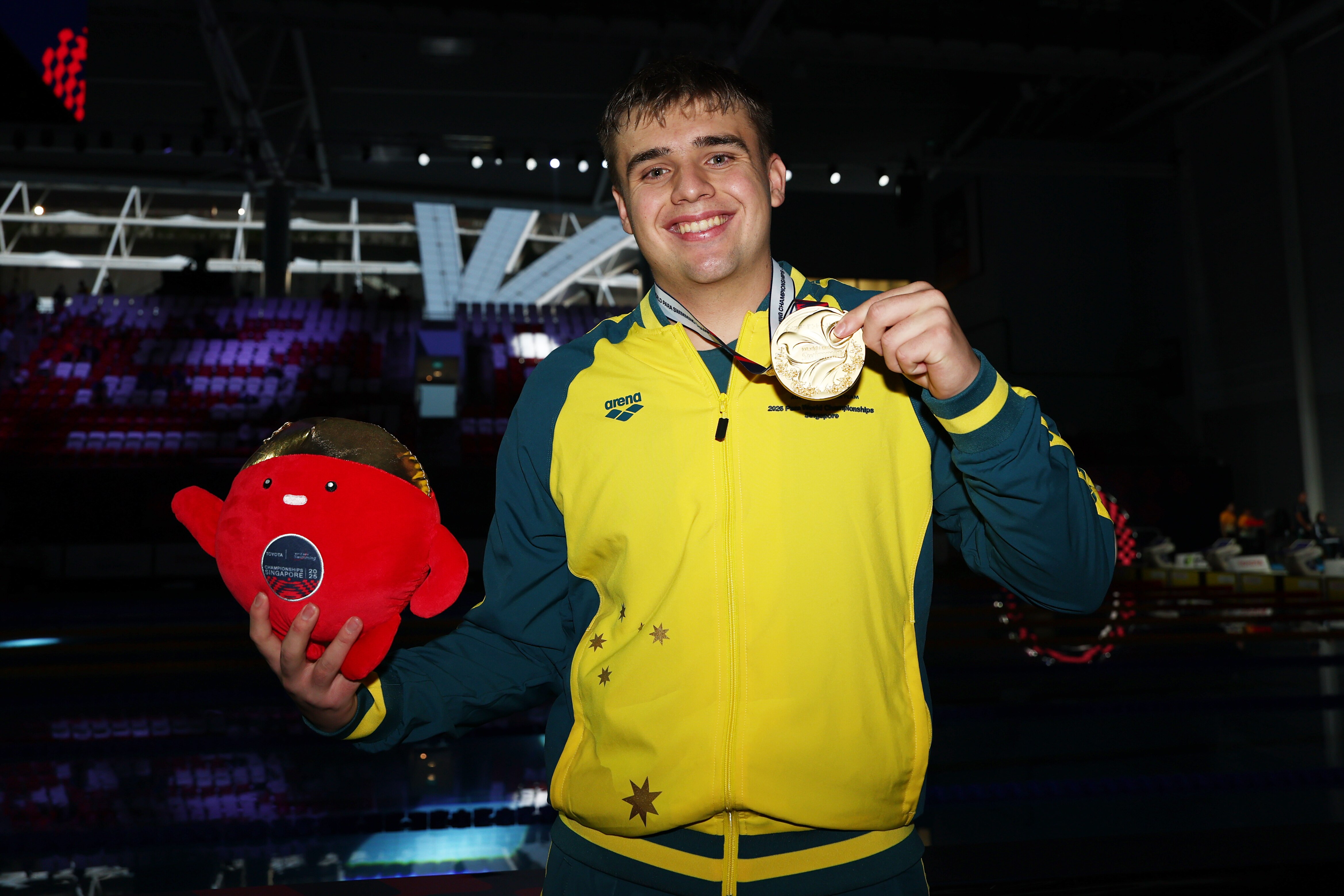 Callum Simpson poses with his 2025 World Para Swimming Championships gold medal