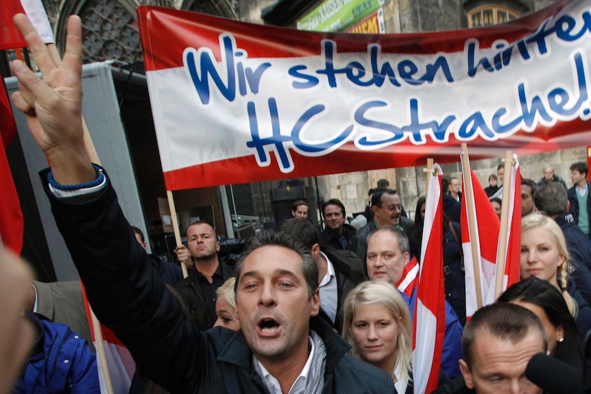 Head of the Austrian right-wing Freedom Party (FPOe) Heinz Christian Strache cheers during the final election rally in Vienna