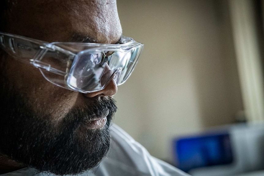 A man in goggles up close