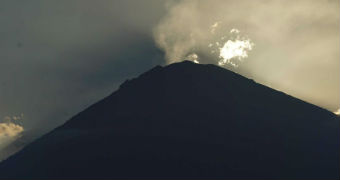 Mount Agung venting steam vapour ahead of a likely eruption.