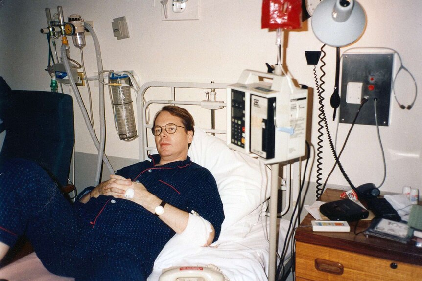 Mark Colvin lies in a hospital bed in Charing Cross Hospital, London, in 1994.