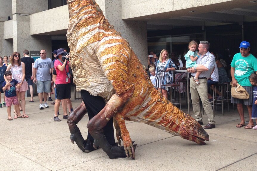 Body of people-powered dinosaur puppet, an Australiovenator