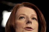 Ms Gillard tied with Mr Abbott as preferred prime minister in the poll for the first time.
